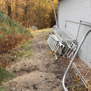 Non-armored dripline next to creek